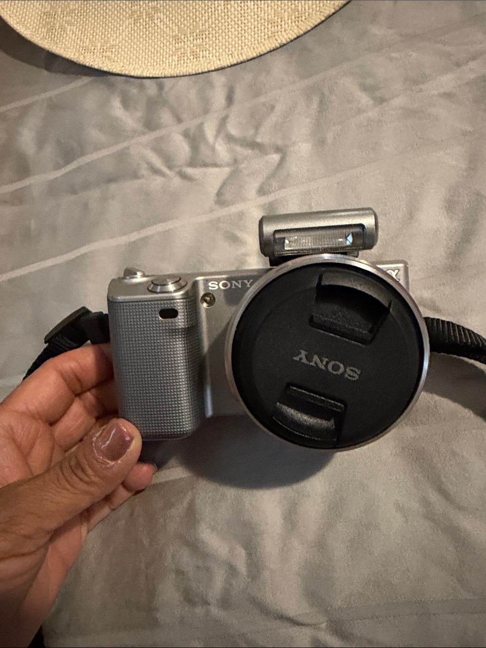 Sony Silver Compact Mirrorless Camera with Black Lens Cap